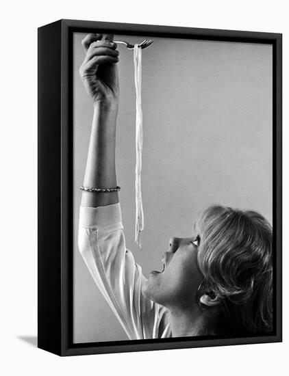 Hayley Mills Attempting to Eat Spaghetti-Ralph Crane-Framed Stretched Canvas