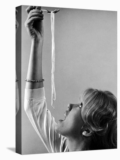 Hayley Mills Attempting to Eat Spaghetti-Ralph Crane-Stretched Canvas