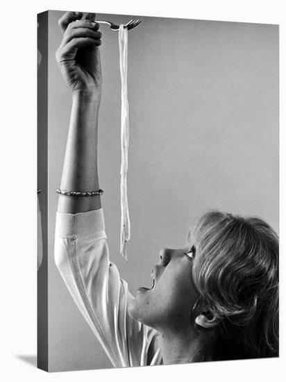 Hayley Mills Attempting to Eat Spaghetti-Ralph Crane-Stretched Canvas