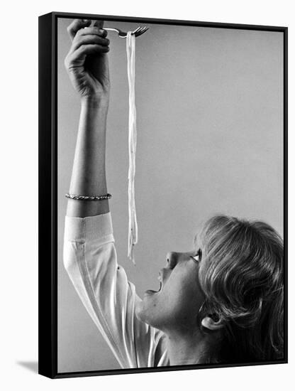 Hayley Mills Attempting to Eat Spaghetti-Ralph Crane-Framed Stretched Canvas