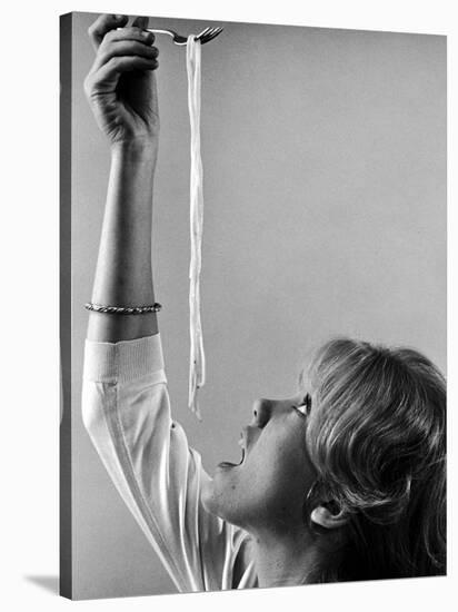 Hayley Mills Attempting to Eat Spaghetti-Ralph Crane-Stretched Canvas