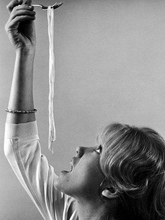 https://imgc.allpostersimages.com/img/posters/hayley-mills-attempting-to-eat-spaghetti_u-L-P3NHS80.jpg?artPerspective=n