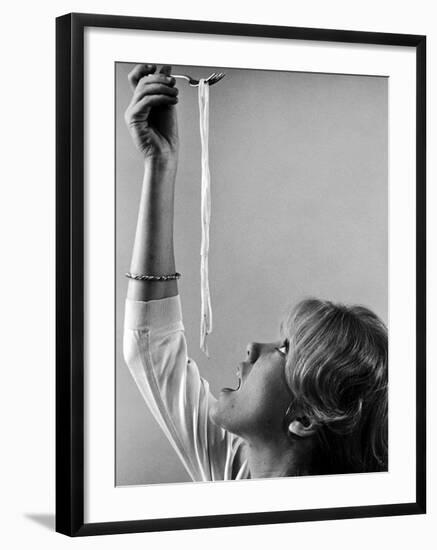 Hayley Mills Attempting to Eat Spaghetti-Ralph Crane-Framed Photographic Print