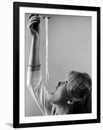 Hayley Mills Attempting to Eat Spaghetti-Ralph Crane-Framed Photographic Print