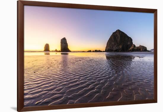 Haystack Rock and The Needles at sunset, with textured sand in the foreground-francesco vaninetti-Framed Photographic Print