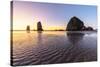 Haystack Rock and The Needles at sunset, with textured sand in the foreground-francesco vaninetti-Stretched Canvas