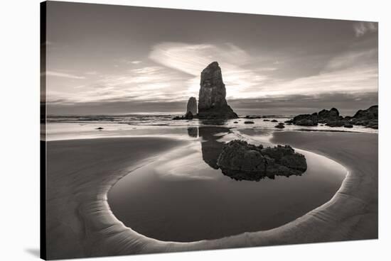 Haystack Rock Pinnacles at low tide in Cannon Beach, Oregon, USA-Chuck Haney-Stretched Canvas