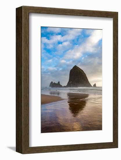 Haystack Rock reflected on the shoreline at Cannon Beach on the Pacific Northwest coast, Oregon, Un-Martin Child-Framed Photographic Print