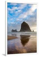 Haystack Rock reflected on the shoreline at Cannon Beach on the Pacific Northwest coast, Oregon, Un-Martin Child-Framed Premium Photographic Print