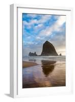 Haystack Rock reflected on the shoreline at Cannon Beach on the Pacific Northwest coast, Oregon, Un-Martin Child-Framed Photographic Print