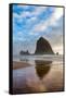 Haystack Rock reflected on the shoreline at Cannon Beach on the Pacific Northwest coast, Oregon, Un-Martin Child-Framed Stretched Canvas