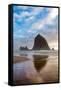 Haystack Rock reflected on the shoreline at Cannon Beach on the Pacific Northwest coast, Oregon, Un-Martin Child-Framed Stretched Canvas
