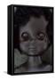 Head and Shoulders of Modern Plastic Black Girl Doll Slightly Scratched and Soiled Lying-Den Reader-Framed Stretched Canvas