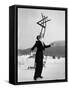 Head Waiter Rene Breguet Balancing Chair on Chin at Ice Rink of Grand Hotel-Alfred Eisenstaedt-Framed Stretched Canvas