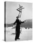 Head Waiter Rene Breguet Balancing Chair on Chin at Ice Rink of Grand Hotel-Alfred Eisenstaedt-Stretched Canvas