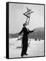 Head Waiter Rene Breguet Balancing Chair on Chin at Ice Rink of Grand Hotel-Alfred Eisenstaedt-Framed Stretched Canvas