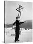 Head Waiter Rene Breguet Balancing Chair on Chin at Ice Rink of Grand Hotel-Alfred Eisenstaedt-Stretched Canvas