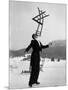 Head Waiter Rene Breguet Balancing Chair on Chin at Ice Rink of Grand Hotel-Alfred Eisenstaedt-Mounted Photographic Print