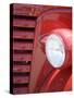 Headlight and Partial Grill of a Red Antique Truck-Kathleen Clemons-Stretched Canvas