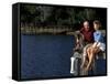 Healthy Couple Sitting on the Dock by a Lake-Bill Bachmann-Framed Stretched Canvas