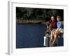 Healthy Couple Sitting on the Dock by a Lake-Bill Bachmann-Framed Photographic Print