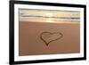 Heart in the Sand on the Beach at Sunset.-Hannamariah-Framed Photographic Print