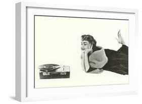 Heavily Browed Lady Listening to Record Player-null-Framed Art Print