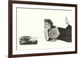 Heavily Browed Lady Listening to Record Player-null-Framed Art Print