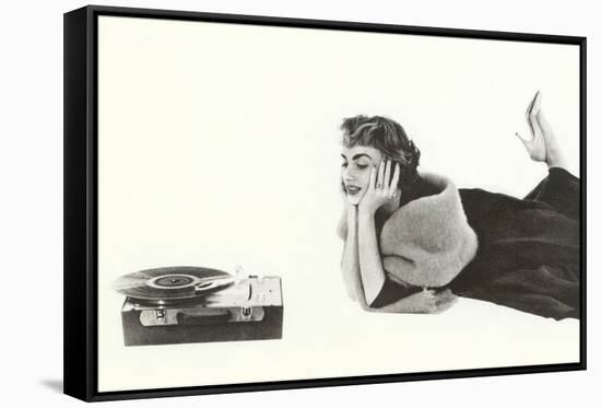 Heavily Browed Lady Listening to Record Player-null-Framed Stretched Canvas