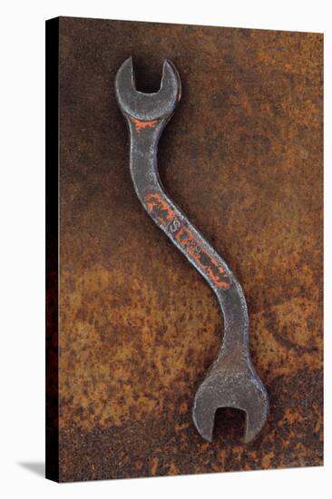 Heavy Double-headed Spanner with Bend in Handle Lying On Rusty Metal Sheet-Den Reader-Stretched Canvas