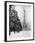 Heavy Snow Blankets the Ground Near the Eiffel Tower-Dmitri Kessel-Framed Photographic Print