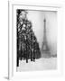 Heavy Snow Blankets the Ground Near the Eiffel Tower-Dmitri Kessel-Framed Photographic Print