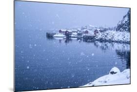 Heavy Snowfall on the Fishing Village and the Icy Sea, Nusfjord, Lofoten Islands, Arctic, Norway-Roberto Moiola-Mounted Photographic Print