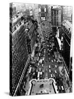 Heavy Traffic Moves Along Broadway and Seventh Avenue-null-Stretched Canvas