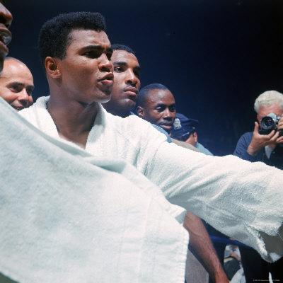 https://imgc.allpostersimages.com/img/posters/heavyweight-boxer-cassius-clay-aka-muhammad-ali-after-his-fight-with-sonny-liston_u-L-P43CWJ0.jpg?artPerspective=n