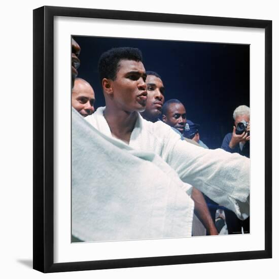 Heavyweight Boxer Cassius Clay, aka Muhammad Ali, After His Fight with Sonny Liston-John Dominis-Framed Premium Photographic Print