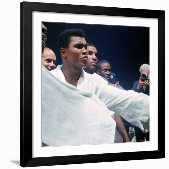 Heavyweight Boxer Cassius Clay, aka Muhammad Ali, After His Fight with Sonny Liston-John Dominis-Framed Premium Photographic Print