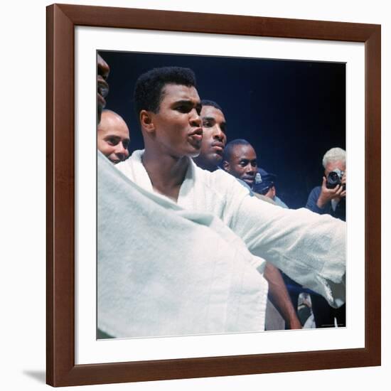 Heavyweight Boxer Cassius Clay, aka Muhammad Ali, After His Fight with Sonny Liston-John Dominis-Framed Premium Photographic Print