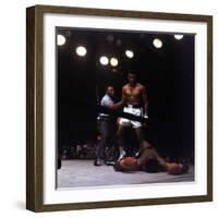 Heavyweight Boxer Cassius Clay, aka Muhammad Ali, Standing over Opponent Sonny Liston-George Silk-Framed Premium Photographic Print