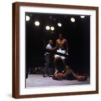 Heavyweight Boxer Cassius Clay, aka Muhammad Ali, Standing over Opponent Sonny Liston-George Silk-Framed Premium Photographic Print