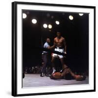 Heavyweight Boxer Cassius Clay, aka Muhammad Ali, Standing over Opponent Sonny Liston-George Silk-Framed Premium Photographic Print