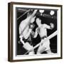 Heavyweight Champion Rocky Marciano (Right) Backs Roland Lastarza Against the Ropes-null-Framed Photo