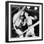 Heavyweight Champion Rocky Marciano (Right) Backs Roland Lastarza Against the Ropes-null-Framed Photo