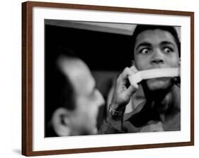 Heavyweight Contender Cassius Clay, Getting His Mouth Taped by Trainer Angelo Dundee-George Silk-Framed Premium Photographic Print