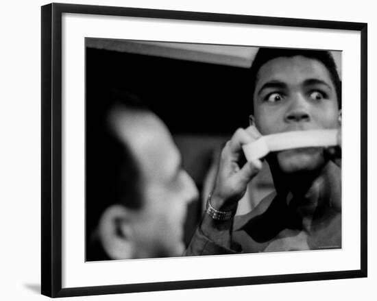 Heavyweight Contender Cassius Clay, Getting His Mouth Taped by Trainer Angelo Dundee-George Silk-Framed Premium Photographic Print