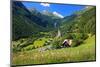 Heiligenblut at Grossglockner High Alpine Road with view towards Grossglockner-null-Mounted Art Print