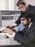 Two Technicians Check a Computer Printout-Heinz Zinram-Photographic Print