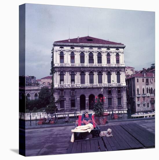 Heiress Peggy Guggenheim Sunbathing on Terrace of Venier Dei Leoni Palace on Grand Canal in Venice-Frank Scherschel-Stretched Canvas