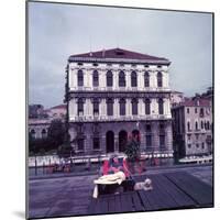 Heiress Peggy Guggenheim Sunbathing on Terrace of Venier Dei Leoni Palace on Grand Canal in Venice-Frank Scherschel-Mounted Premium Photographic Print