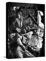 Helicopter Crew Chief James C. Farley Shouting to Crew as Wounded Comrades Lay Dying at His Feet-Larry Burrows-Stretched Canvas
